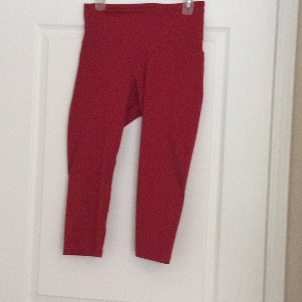 Red leggings with side pockets